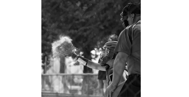 Softball players aren’t afraid of a little dirt